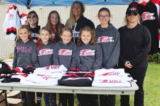 Members of the Frontenac Fury organization of all ages were out in force at the Frontenac Community Arena Sunday. Pictured: Lynn Newton, Tanya Thake, Kelly Allport, Leah Rinen, Morgan Rinen, Sydeny English, Ella Allport, Leah Rumbolt, Jenna Norman. Photo/Craig Bakay